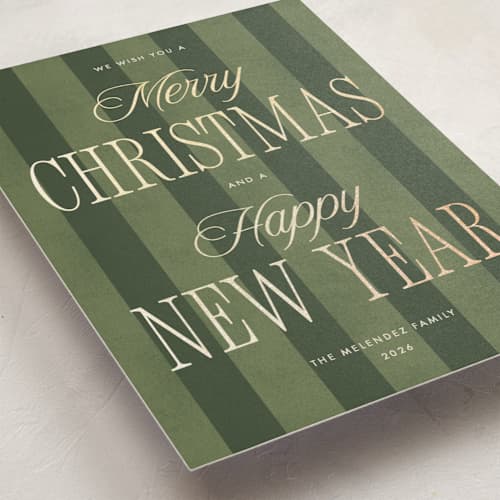 This is a pine foil pressed holiday cards with foil pressed by Robert and Stella called striped type printing on signature in standard