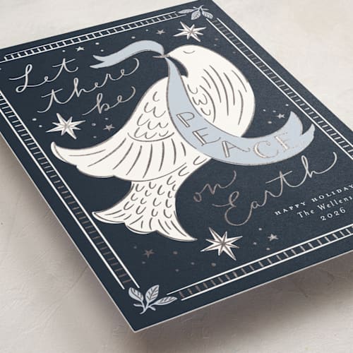 This is a night foil pressed holiday cards with foil pressed by Erin German called peace on earth dove printing on signature in standard