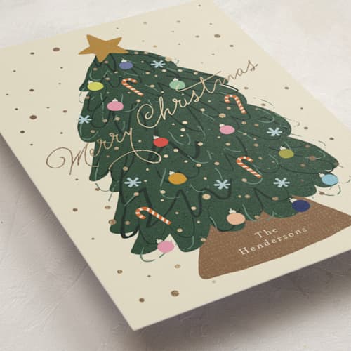 This is a vanilla foil pressed holiday cards with foil pressed by Kelly Watkins called sparkle tree printing on signature in standard