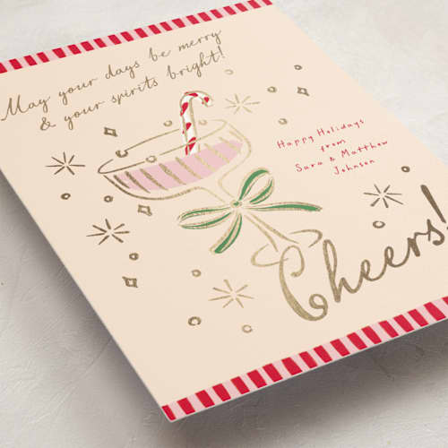 This is a cosmo foil pressed holiday cards with foil pressed by Erin German called festive spirit printing on signature in standard