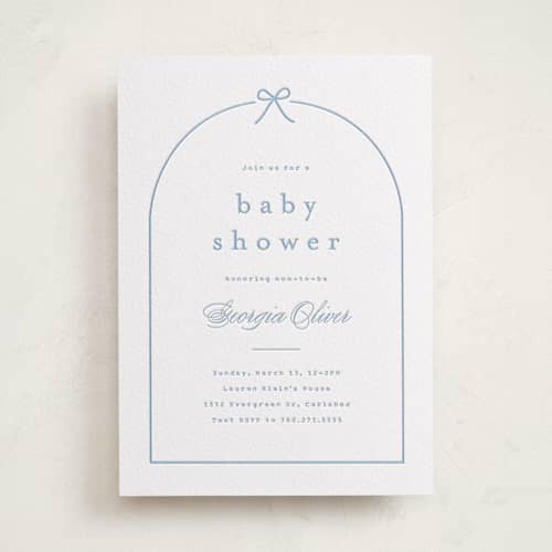 This is a robin's egg baby shower invitations with letterpress by Carolyn MacLaren called arching bow printing on white cotton in standard