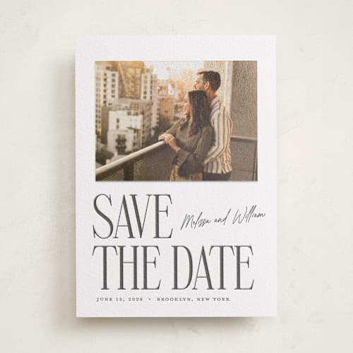 This is a soft black save the date with letterpress by Ekko Studio called merry stack printing on luxe white cotton in photo_mount