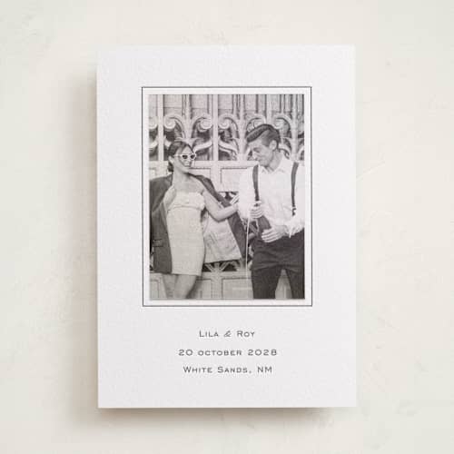 This is a soft black save the date with letterpress by Ani Somi called sophisticate printing on luxe white cotton in photo_mount