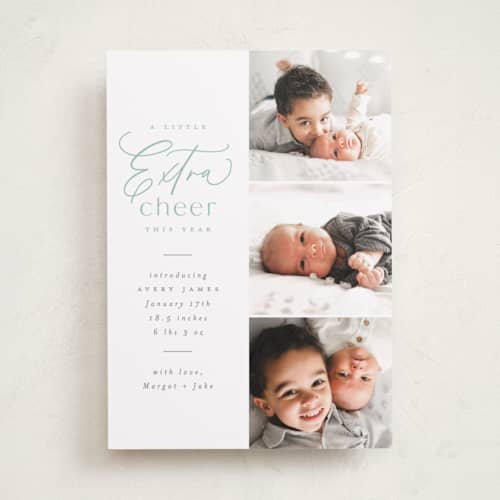 This is a mint babys first christmas with standard by Everett Paper Goods called extra cheer here printing on recycled smooth signature in standard