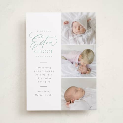 This is a mint babys first christmas with standard by Everett Paper Goods called extra cheer here printing on recycled smooth signature in standard