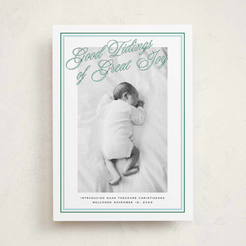 This is a powder babys first christmas with standard by Jenna Holcomb called joyous classic printing on recycled smooth signature in standard