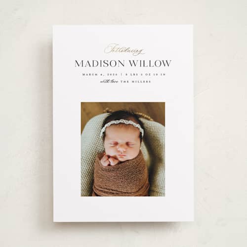 This is a sugar foil stamped birth announcements with foil pressed by Pixel and Hank called now introducing printing on recycled smooth signature in standard