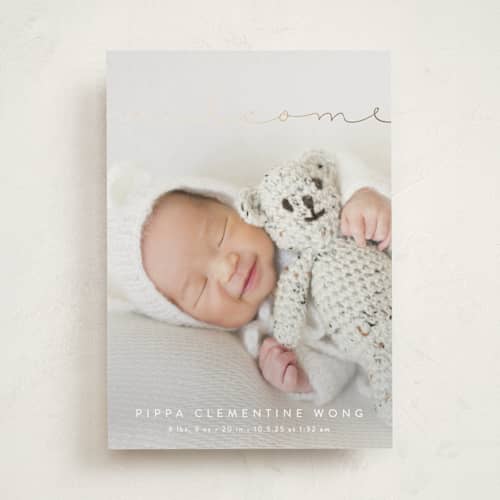 This is a cloud foil stamped birth announcements with foil pressed by Olivia Raufman called delicate welcome printing on recycled smooth signature in standard