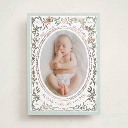 This is a turquoise foil stamped birth announcements with foil pressed by Leah Bisch called nature frame printing on recycled smooth signature in standard