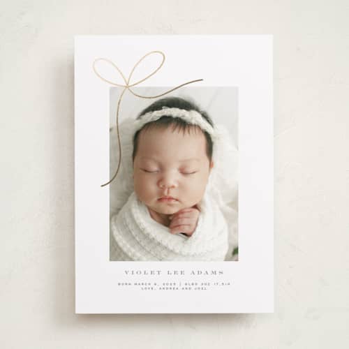 This is a sugar foil stamped birth announcements with foil pressed by Yuliya Evseeva called little bow printing on recycled smooth signature in standard