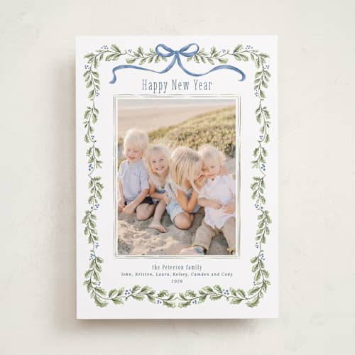 This is a frost photo christmas cards with standard by Paula Pecevich called holly garland and bow printing on recycled smooth signature in standard