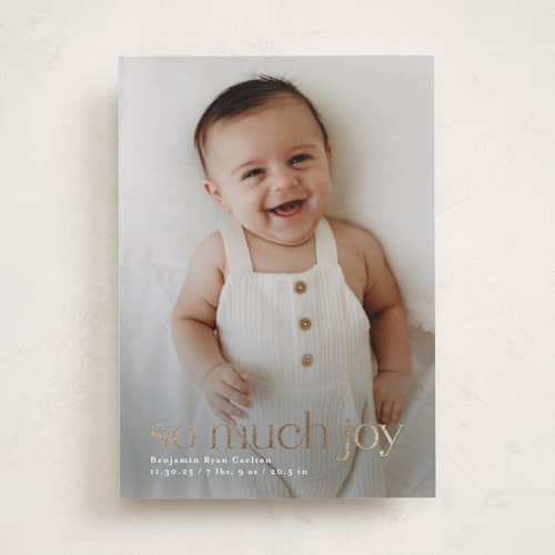 This is a snowfall babys first christmas with foil pressed by Mary Kay Garttmeier called baby joy printing on recycled smooth signature in standard