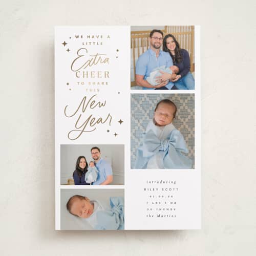 This is a snowfall babys first christmas with foil pressed by Everett Paper Goods called extra cheerful printing on recycled smooth signature in standard