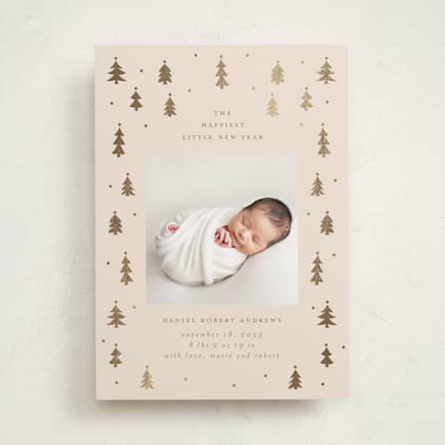 This is a candlelight babys first christmas with foil pressed by Jennifer Holbrook called merry little trees printing on recycled smooth signature in standard