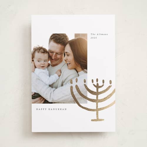 This is a gilded hanukkah cards with foil pressed by Sumak Studio called golden menorah printing on recycled smooth signature in standard