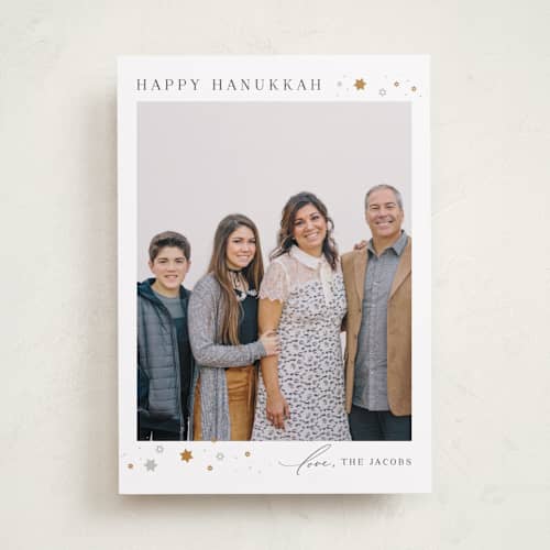 This is a candlelight hanukkah cards with standard by Laura Bercovich called sparkling printing on recycled smooth signature in standard