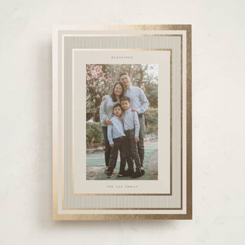 This is a champagne foil pressed holiday cards with foil pressed by Lori Wemple called classic stripe printing on recycled smooth signature in standard