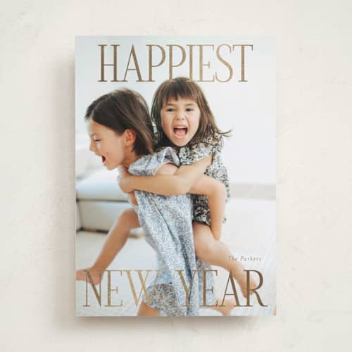 This is a gold leaf foil pressed holiday cards with foil pressed by Angela Thompson called new year joy printing on recycled smooth signature in standard