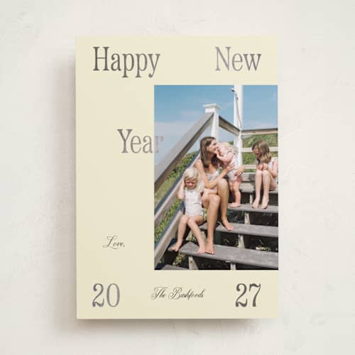 This is a champagne foil pressed holiday cards with foil pressed by Rachel Cassel called it's spaced printing on recycled smooth signature in standard