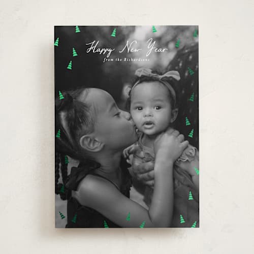 This is a snow foil pressed holiday cards with foil pressed by Heather Schertzer called tree lot printing on recycled smooth signature in standard