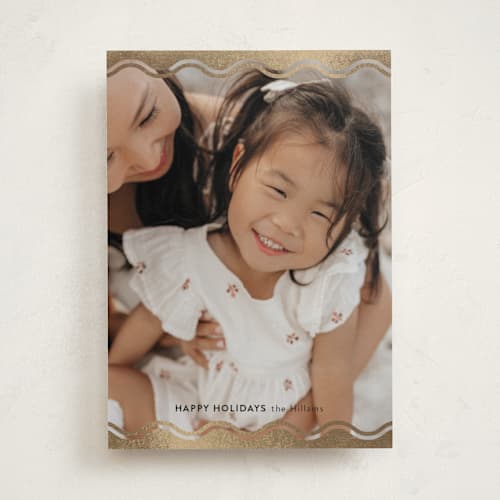 This is a night foil pressed holiday cards with foil pressed by Danie Romrell called ric rac top and bottom printing on recycled smooth signature in standard