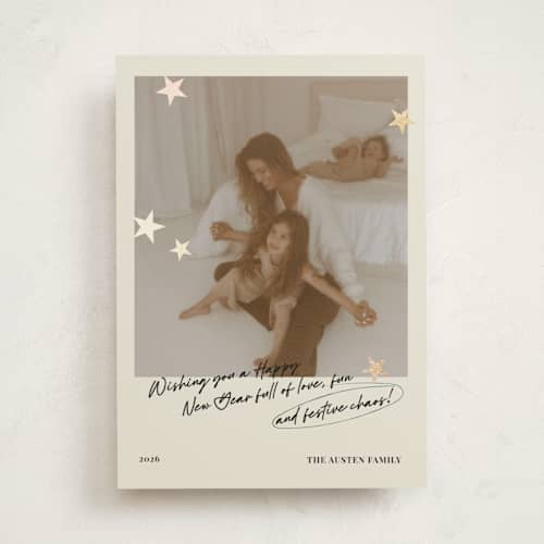 This is a buttercream foil pressed holiday cards with foil pressed by Helena Vitto called messy christmas printing on recycled smooth signature in standard