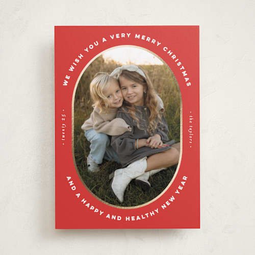 This is a poinsettia foil pressed holiday cards with foil pressed by Erica Krystek called oval frame printing on recycled smooth signature in standard