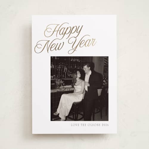 This is a snow foil pressed holiday cards with foil pressed by Nicole Walsh called happy script printing on recycled smooth signature in standard