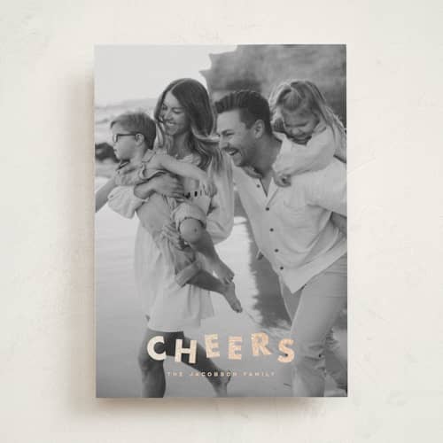 This is a champagne foil pressed holiday cards with foil pressed by Ellen Schlegelmilch called glitter cheers printing on recycled smooth signature in standard