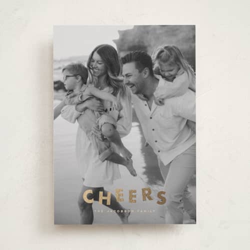 This is a latte foil pressed holiday cards with foil pressed by Ellen Schlegelmilch called glitter cheers printing on recycled smooth signature in standard