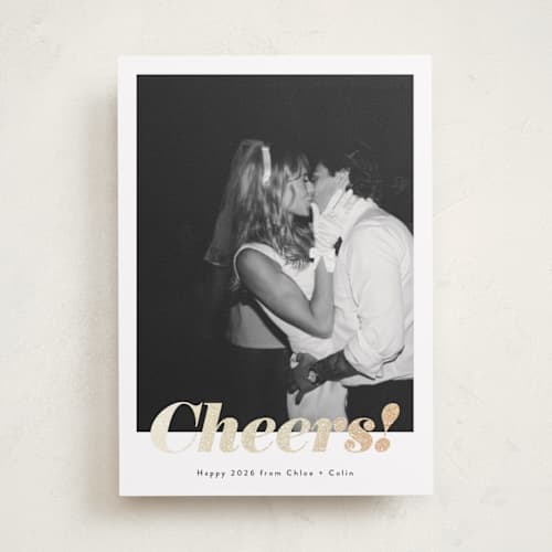 This is a ink foil pressed holiday cards with foil pressed by Emily Sabol Goss called glittering cheers printing on recycled smooth signature in standard
