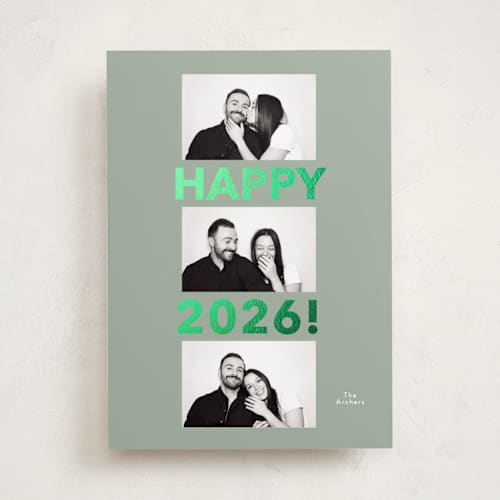 This is a sage foil pressed holiday cards with foil pressed by Angela Thompson called happy year trio printing on recycled smooth signature in standard