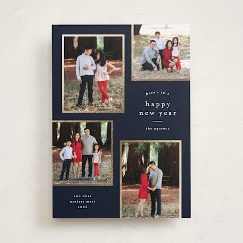 This is a navy foil pressed holiday cards with foil pressed by Stacey Meacham called simply framed printing on recycled smooth signature in standard