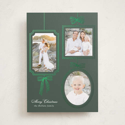 This is a evergreen foil pressed holiday cards with foil pressed by Baumbirdy called bows printing on recycled smooth signature in standard