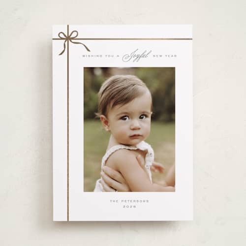 This is a tinsel foil pressed holiday cards with foil pressed by Vanessa Doyle called gift printing on recycled smooth signature in standard