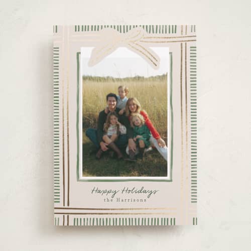 This is a moss foil pressed holiday cards with foil pressed by Chris Griffith called holiday wrap printing on recycled smooth signature in standard