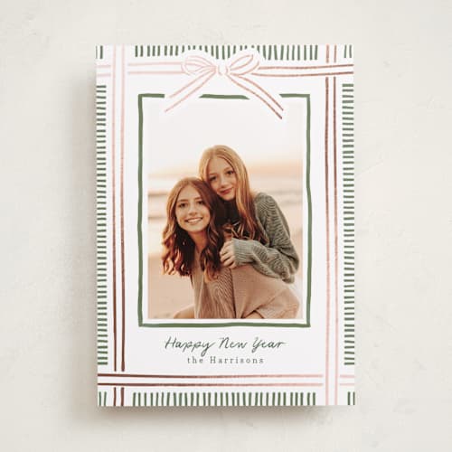 This is a pink sand foil pressed holiday cards with foil pressed by Chris Griffith called holiday wrap printing on recycled smooth signature in standard
