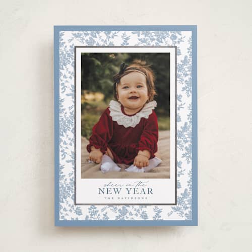 This is a powder foil pressed holiday cards with foil pressed by Jenna Holcomb called merry floral toile printing on recycled smooth signature in standard
