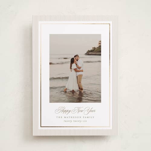 This is a tinsel foil pressed holiday cards with foil pressed by Kelly Schmidt called striped elegance printing on recycled smooth signature in standard