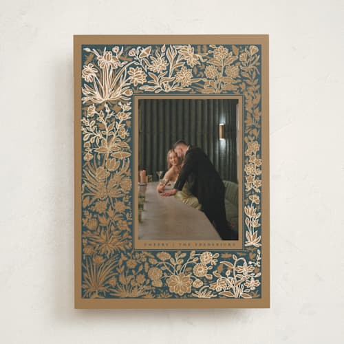 This is a caramel foil pressed holiday cards with foil pressed by Danie Romrell called diving dipper printing on recycled smooth signature in standard