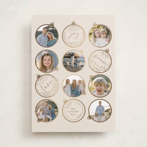 This is a clay foil pressed holiday cards with foil pressed by Teju Reval called gilded ornaments printing on recycled smooth signature in standard