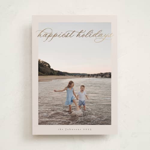 This is a champagne foil pressed holiday cards with foil pressed by Nicole Walsh called serene printing on recycled smooth signature in standard