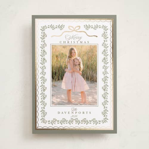 This is a sage foil pressed holiday cards with foil pressed by Susan Moyal called vintage vine printing on recycled smooth signature in standard