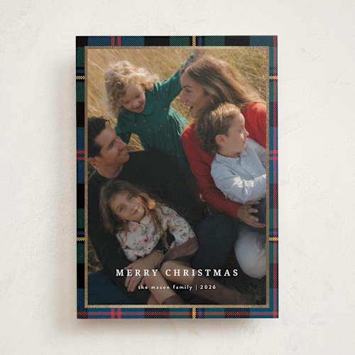 This is a navy foil pressed holiday cards with foil pressed by Ilene Guy called traditionally plaid printing on recycled smooth signature in standard