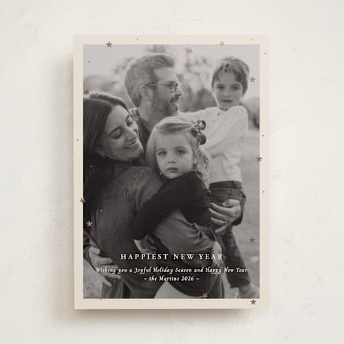 This is a champagne foil pressed holiday cards with foil pressed by Ani Somi called merry little stars printing on recycled smooth signature in standard