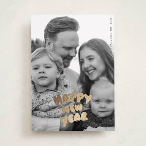This is a coal foil pressed holiday cards with foil pressed by Studio Suku called bubble type printing on recycled smooth signature in standard