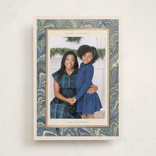 This is a blue spruce foil pressed holiday cards with foil pressed by Jenna Holcomb called marbled printing on recycled smooth signature in standard