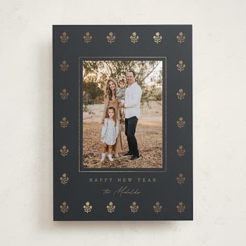 This is a coal foil pressed holiday cards with foil pressed by Angela Garrick called gilded flowers printing on recycled smooth signature in standard