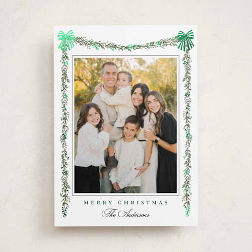 This is a pine foil pressed holiday cards with foil pressed by Susan Moyal called holly & bows printing on recycled smooth signature in standard
