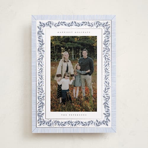 This is a frost foil pressed holiday cards with foil pressed by Jenna Holcomb called antique greenery printing on recycled smooth signature in standard